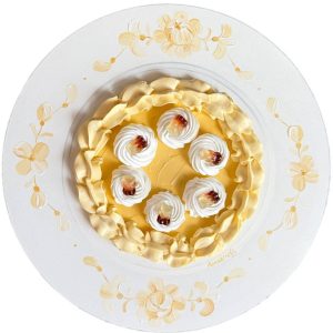 Textured impasto oil painting of a salted caramel cake with gummy bears by Christina Kunanets